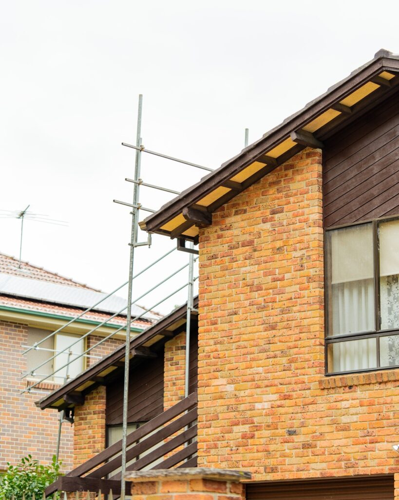 Roof inspection in progress after heavy rain and wind