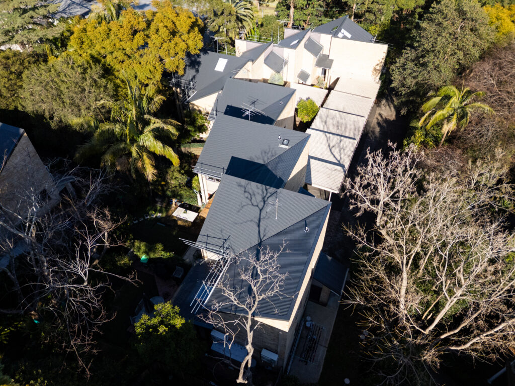 Drone close up of roof leak repair and flashing work in Sydney