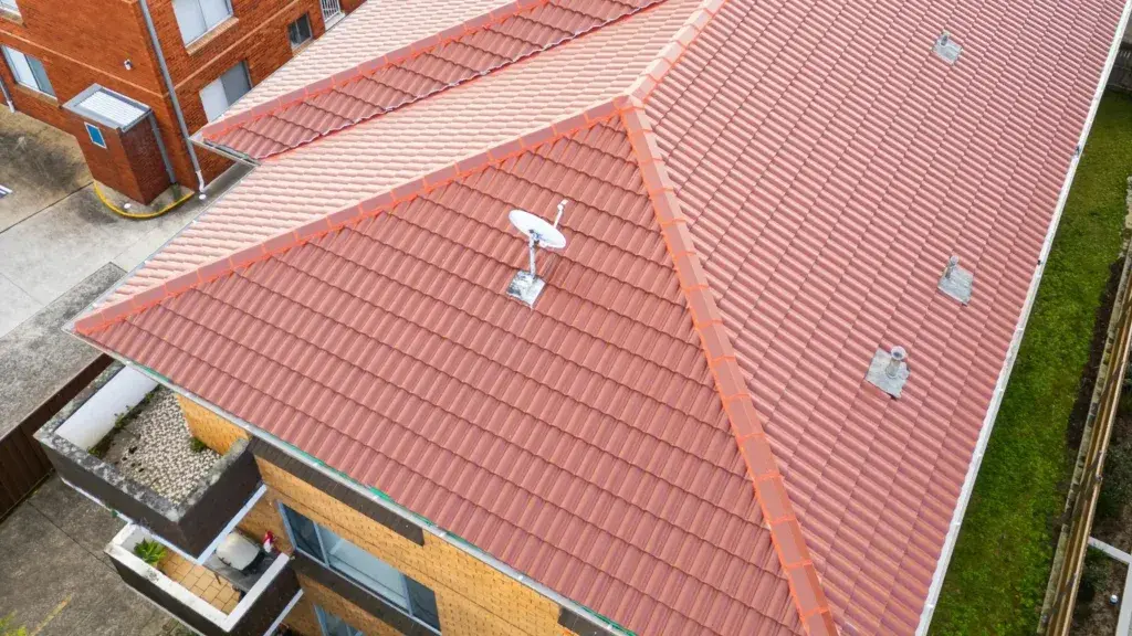 Roof tiles shifting near ridge capping in Sydney showing need for re-bedding