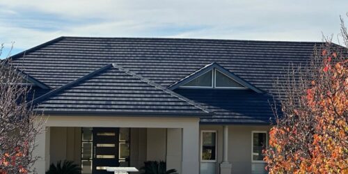 Newly installed commercial roofing membrane on an office building